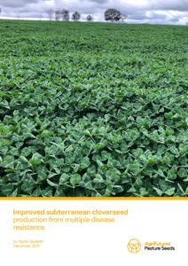 A lush field of subterranean clover stretches to the horizon beneath a cloudy sky, distant trees visible. Text at the bottom highlights improved subterranean cloverseed production from multiple disease resistance in rural agriculture.