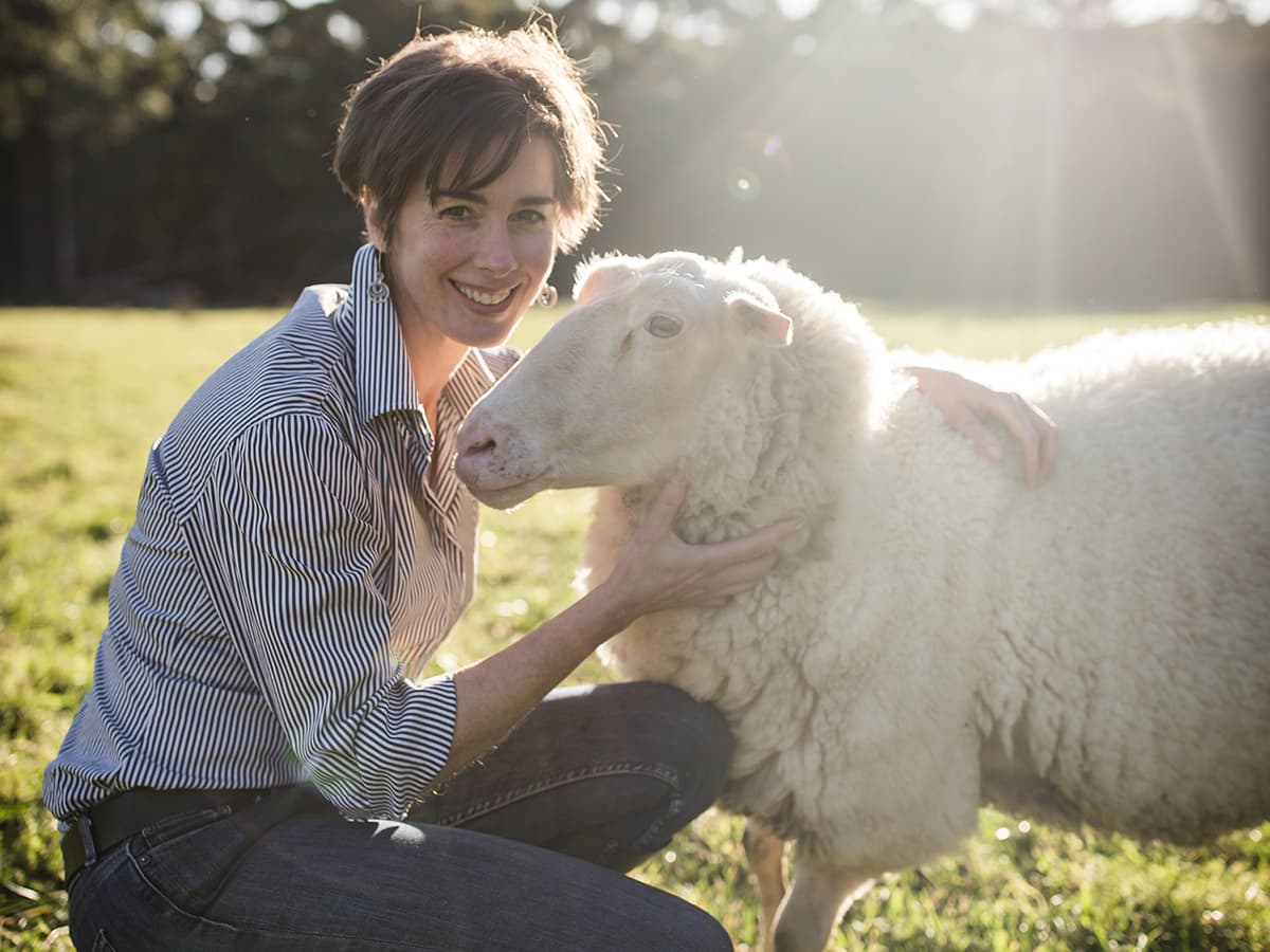 Cressida Cains, winner of 2020 NSW AgriFutures Rural Women's Award with a sheep from her dairy sheep farm, Pecora Dairy