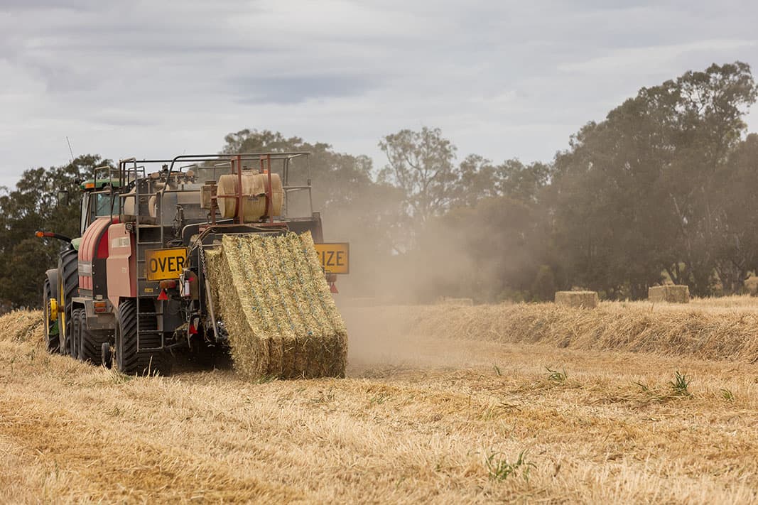 hay baler in paddock