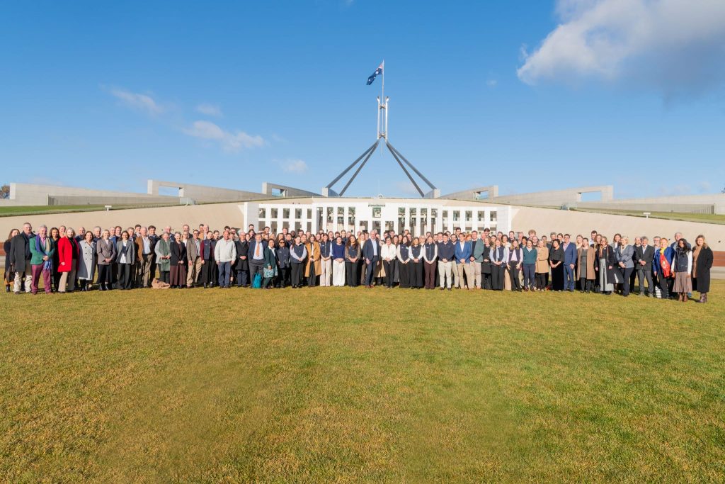 Attendees of the 2025 AgriFutures Australia Summit in front of Parliament House in Canberra