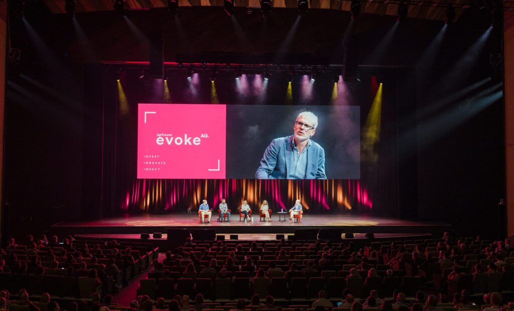 Tim Hunt on a projected screen in front of a panel at AgriFutures evokeAG. 2026, day 1