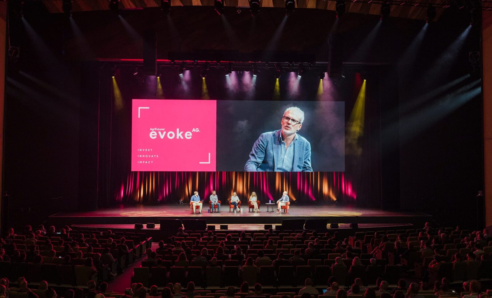 Tim Hunt on a projected screen in front of a panel at AgriFutures evokeAG. 2026, day 1